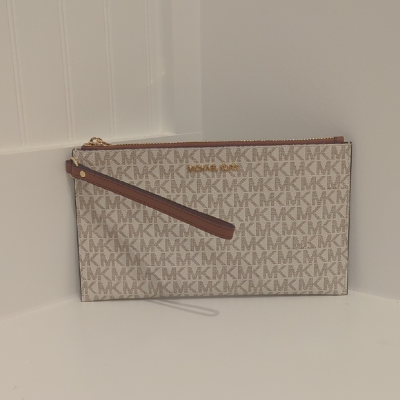#12. Kors Beige and Brown Monogram Clutch - Picture 1 of 4